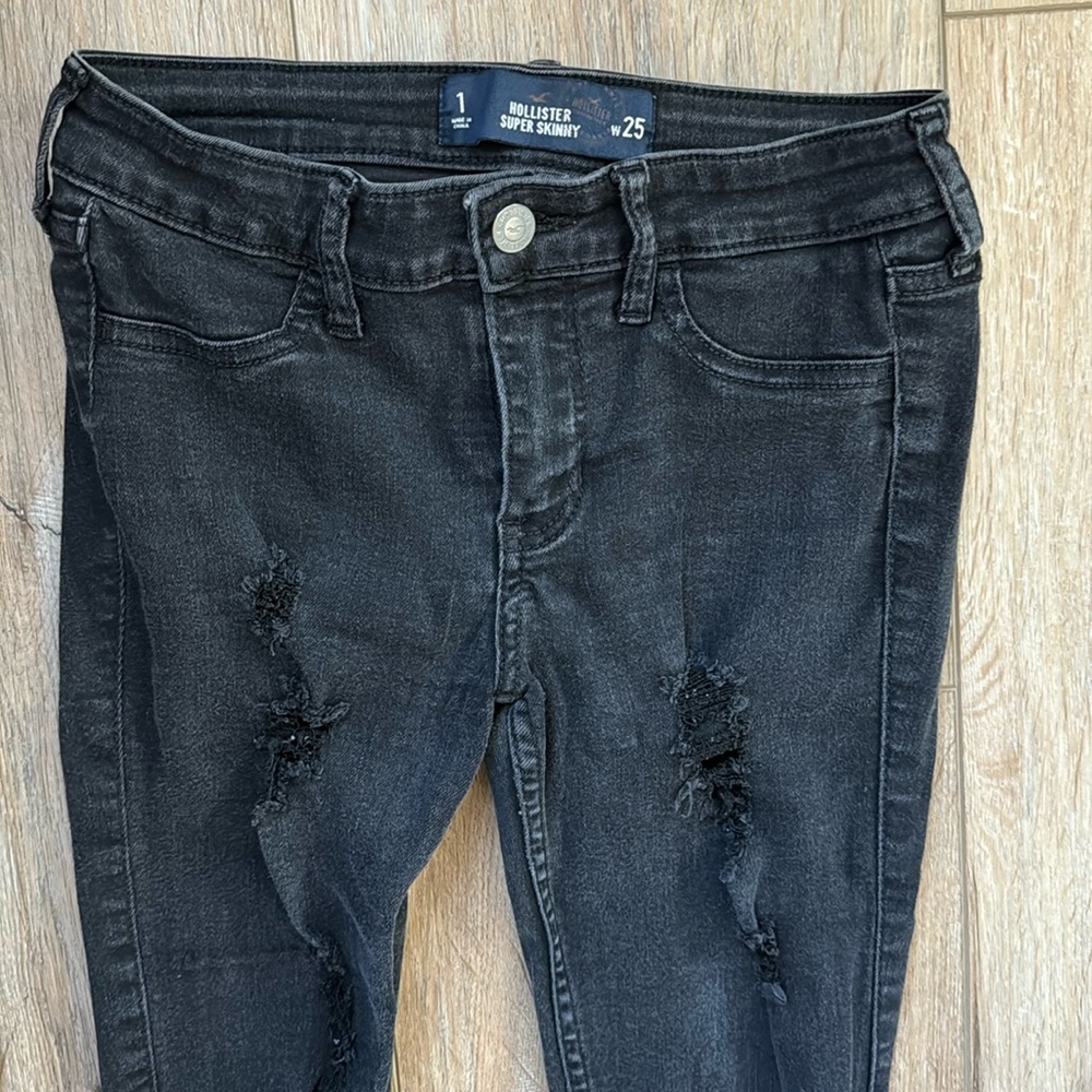 Black skinny jeans with holes